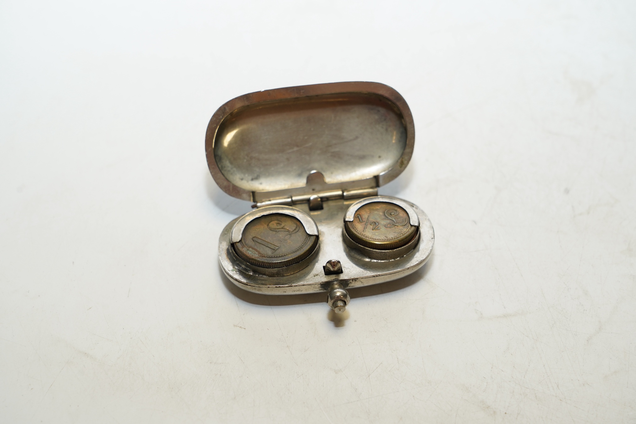 Sundry items comprising a Victorian travelling microscope, a sovereign case, a page turner in the form of a dog and scales. Condition - fair, general wear commensurate with age